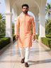 Cotton Silk Self Patterned Peach Kurta with Gold Pyjama